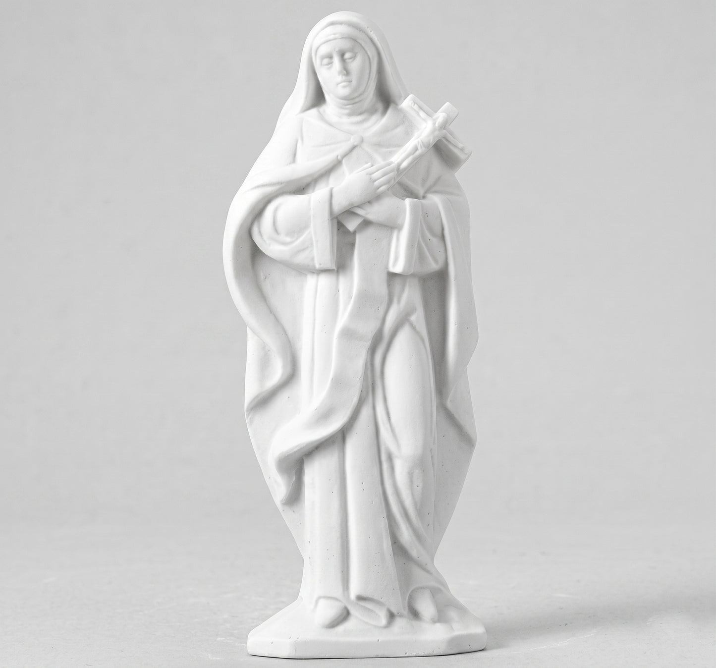 Compra la figura de Santa Teresa en marmolina de 31 cm. Una pieza de artesanía religiosa de alta calidad, perfecta para altares, hogares o colecciones.
