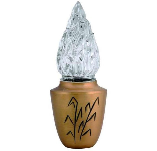 Farol funerario de bronce para lápidas con decoración de espigas y luz a pilas. Portavelas resistente para exterior, diseño clásico y envío a toda España.