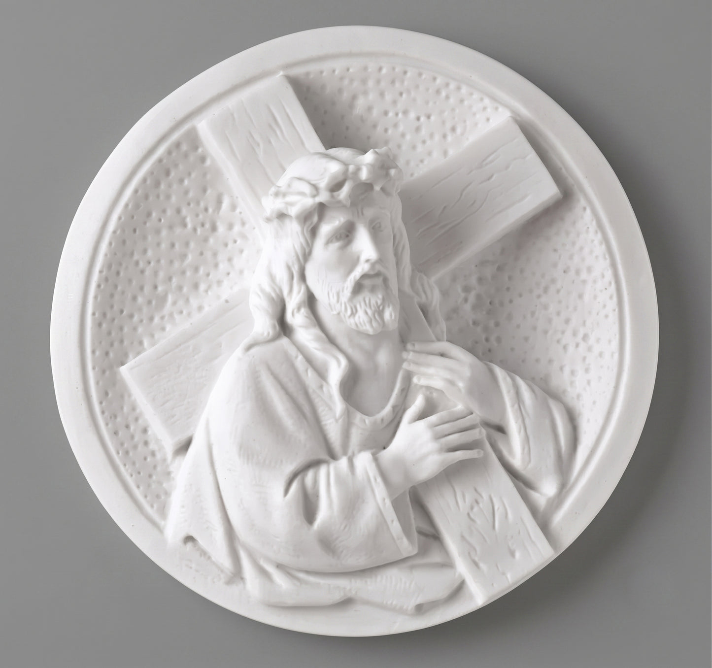 Medallón de marmolina de Jesús Nazareno para la decoración de lápidas. Disponible en 14 y 19 cm. Apto para cementerios y uso exterior.